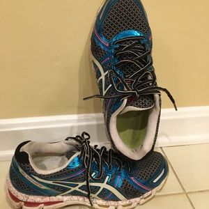 Women’s size 11 ASICS running shoes.